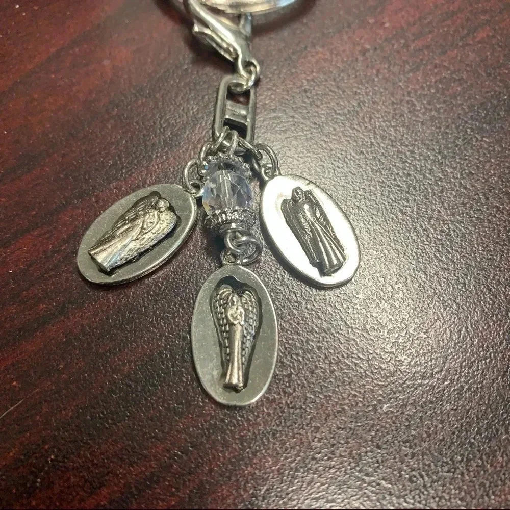 Avon trinity of angels key chain silver tone 4 inches long